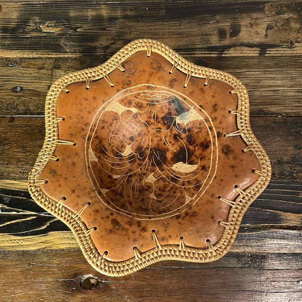 Beautiful leather wrapped plate. Cane around outside